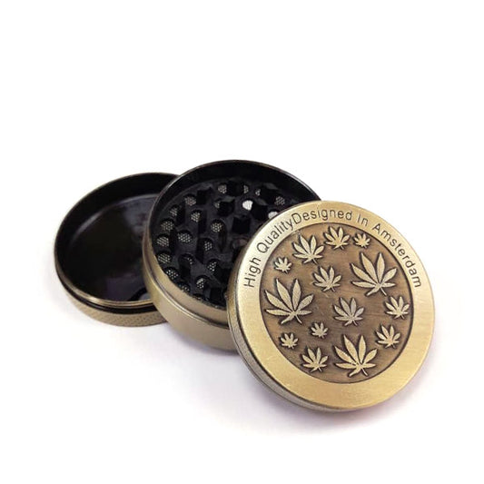 Grinder Polinizador Metal Cannabis Leaves Gold 50 mm.